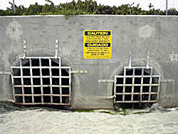 Photo of: stormwater outlet onto an ocean beach